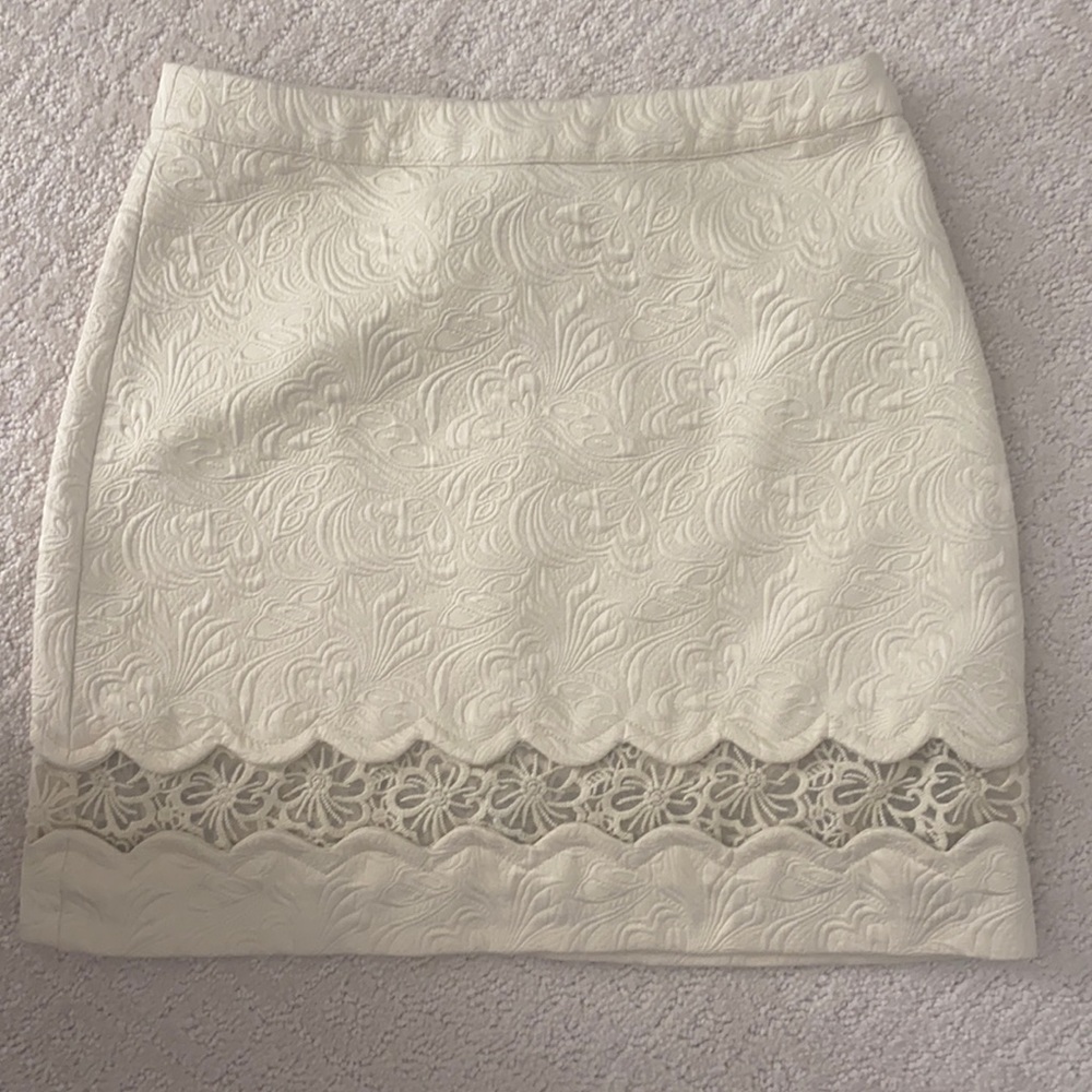 Yellow miniskirt with clear floral panel